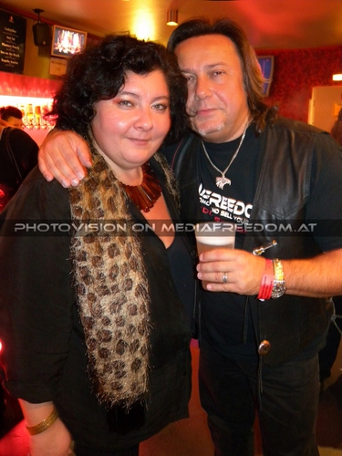 Lady and man in black